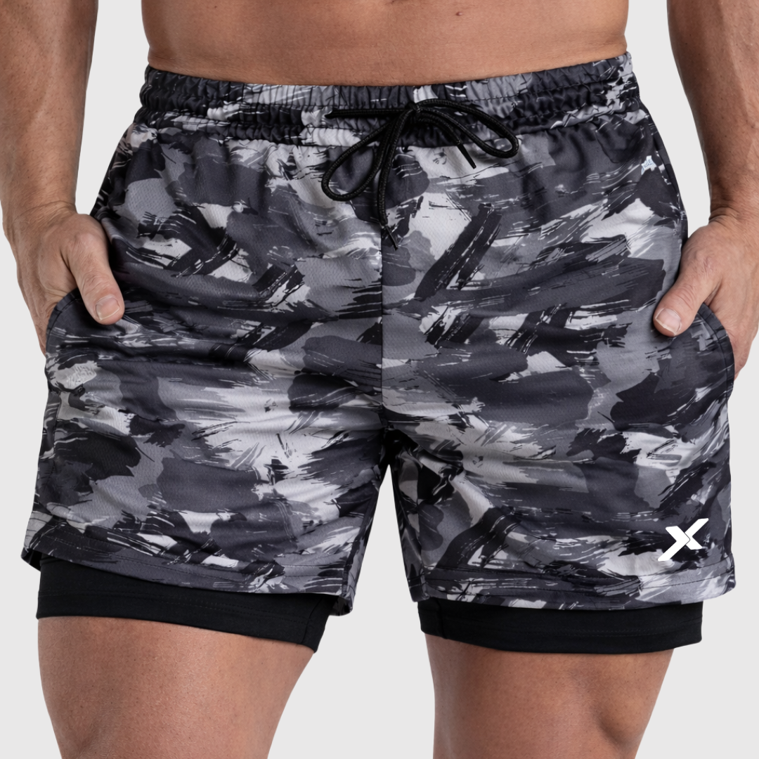 SHORTS DRY-FIT 2 EM 1 DE COMPRESSÃO NEXT - CAMUFLADO CINZA